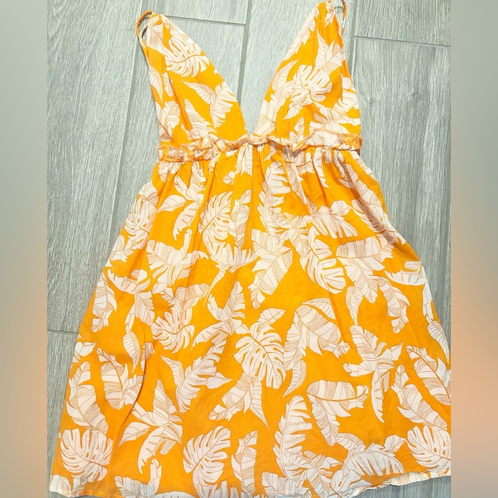 Boutique mini dress in orange size small! Only worn once!